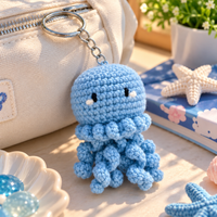 Handmade crochet octopus keychain in light blue
