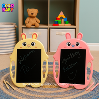 Two cartoon-themed blackboards, one yellow and one pink, with 'Good Baby' branding in a child's playroom.