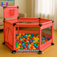 “Pink baby playpen with basketball hoop for active play”