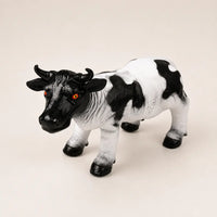 Realistic cow animal figure toy for kids in Pakistan