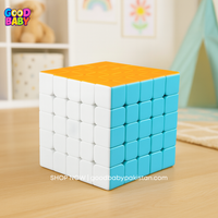 Colorful Rubik's Cube on a wooden surface with 'Good Baby' branding.